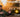 Man in front of custom Sprinter van with off-road lights in desert, SVTV episode text overlay.