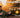 Man in front of custom Sprinter van with off-road lights in desert, SVTV episode text overlay.