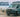 Custom Sprinter van with off-road features in a mountain landscape, RV Industry Association member
