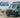 Custom Sprinter van with off-road features in a mountain landscape, RV Industry Association member