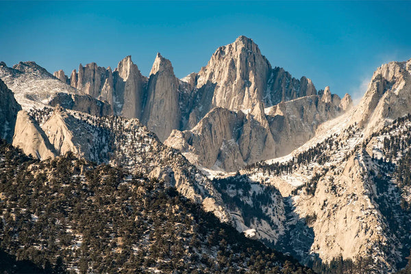 Scenic view of snowy Mount Whitney peaks under a clear blue sky