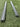 Two 55 inch aluminum roof rack crossbars with ends facing the camera to show the slotted profile