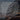 Customer review overlaid on a custom Sprinter van parked by the ocean at sunset.