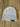 Light gray ribbed knit beanie with Solid Wood Worx tag on wood surface