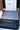 SV L-Shaped Rug at the back of a Mercedes Sprinter build above the Sandy Vans rear step