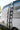 Casper Sprinter side ladder and slotted panel against a dark gray body with the rack above